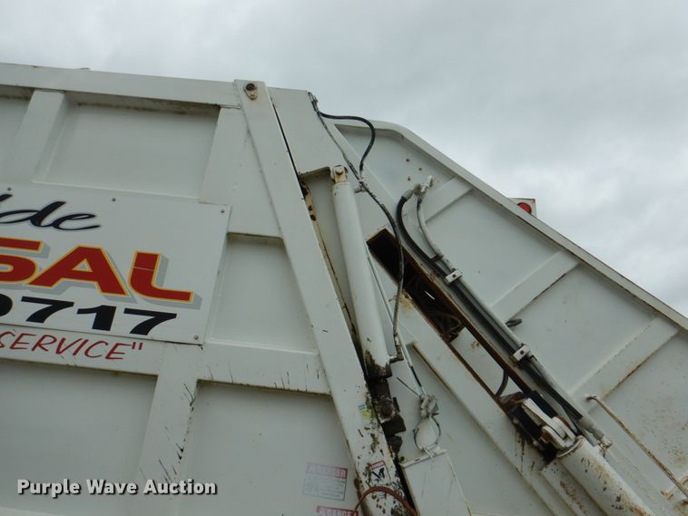 image for item JY9960 1999 Freightliner FL80  refuse truck