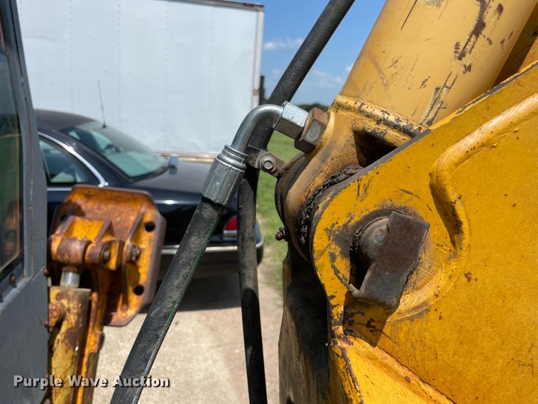 image for item KK9553 John Deere 210C  backhoe
