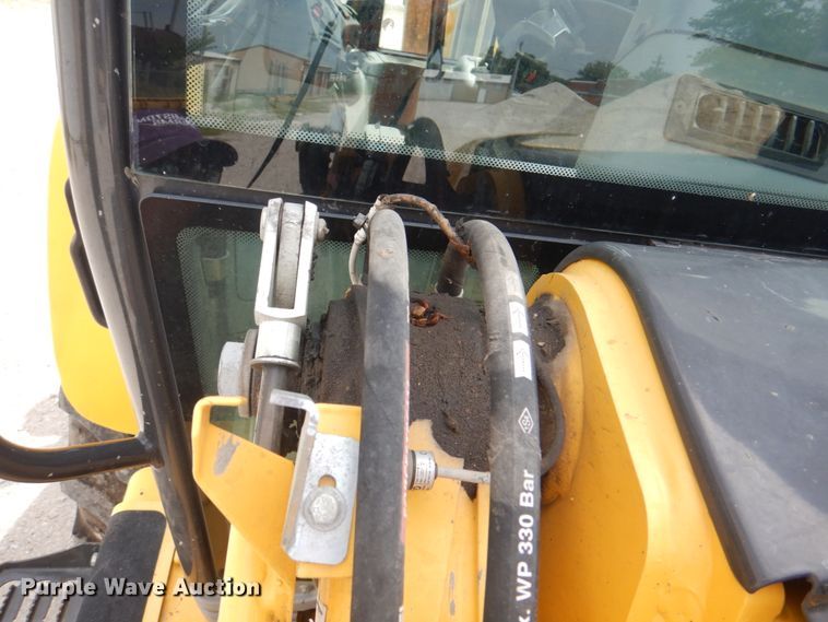image for item KW9834 2013 New Holland B95C  backhoe