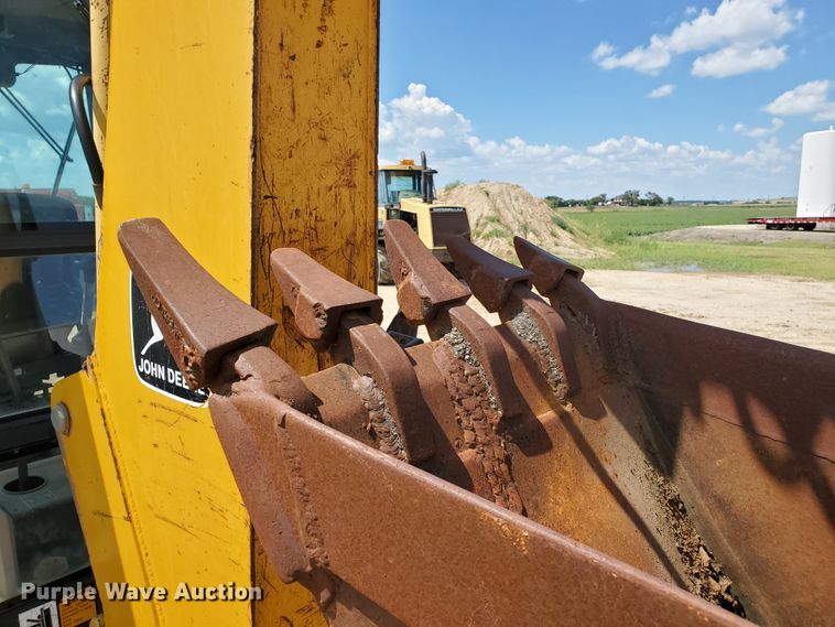 image for item KY9192 1992 John Deere 310D  backhoe