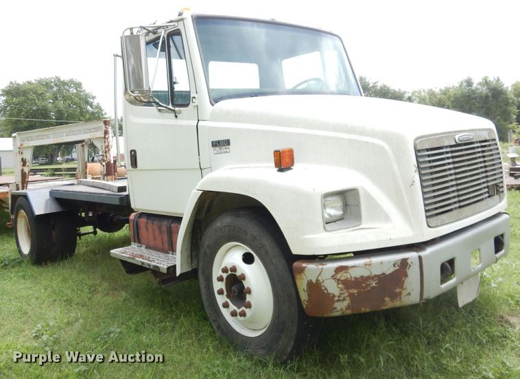image for item DG0841 2002 Freightliner FL60  flatbed truck