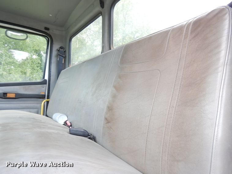 image for item DG0841 2002 Freightliner FL60  flatbed truck