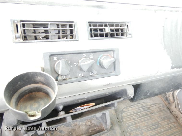 image for item DG0841 2002 Freightliner FL60  flatbed truck