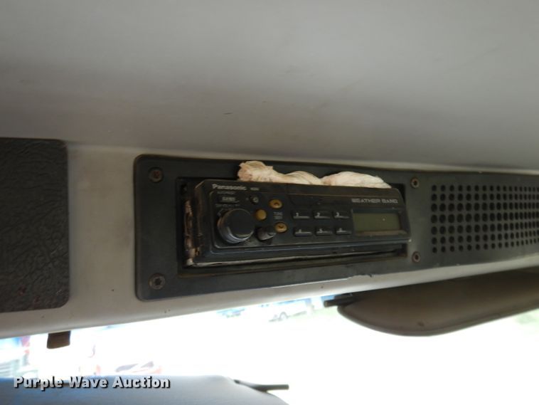 image for item DG0841 2002 Freightliner FL60  flatbed truck