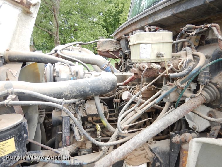 image for item DG0841 2002 Freightliner FL60  flatbed truck