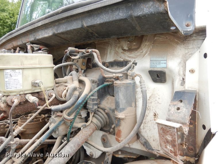 image for item DG0841 2002 Freightliner FL60  flatbed truck