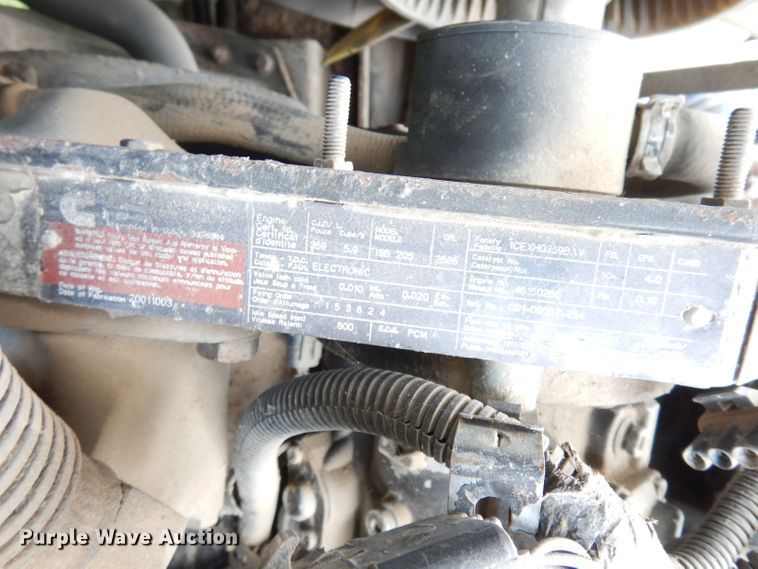 image for item DG0841 2002 Freightliner FL60  flatbed truck