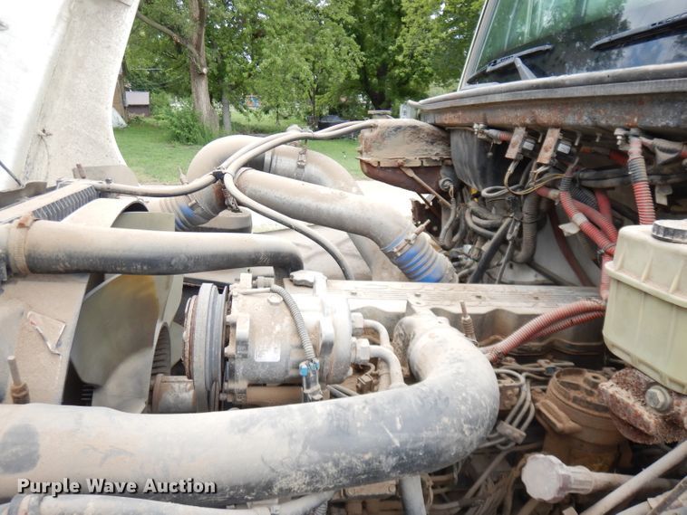 image for item DG0841 2002 Freightliner FL60  flatbed truck