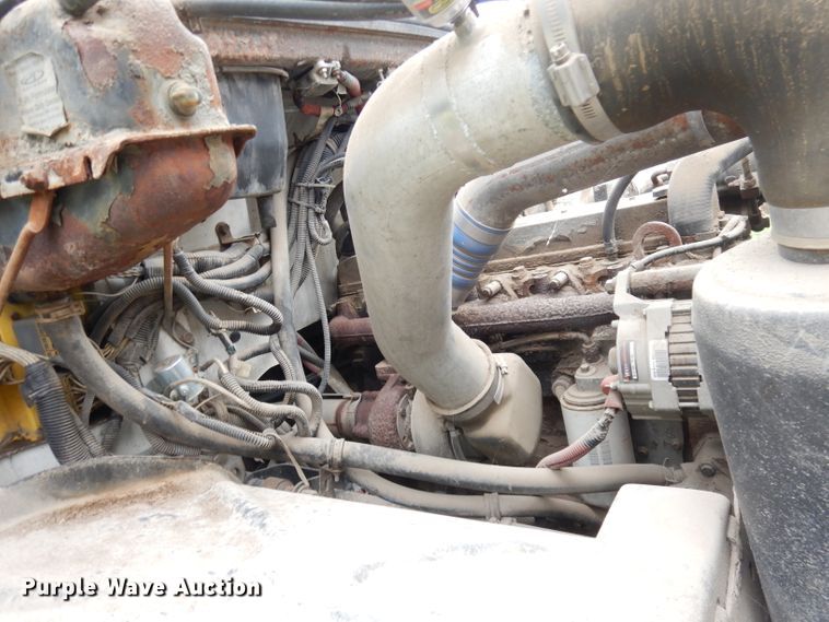 image for item DG0841 2002 Freightliner FL60  flatbed truck