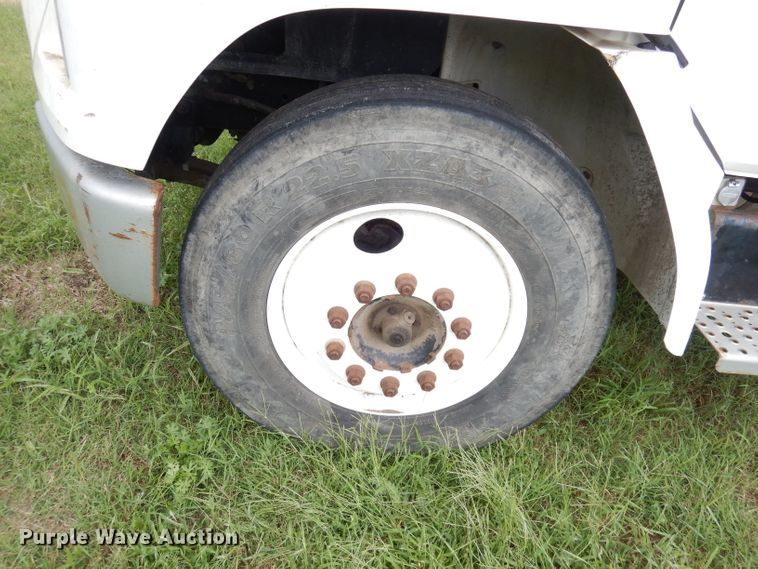 image for item DG0841 2002 Freightliner FL60  flatbed truck