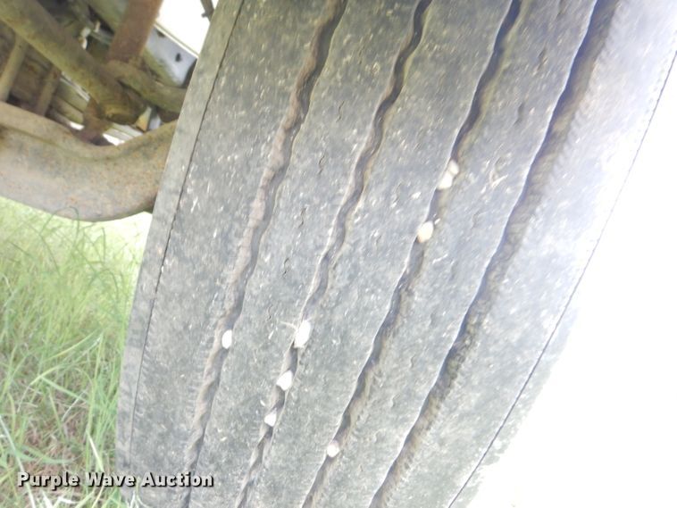 image for item DG0841 2002 Freightliner FL60  flatbed truck