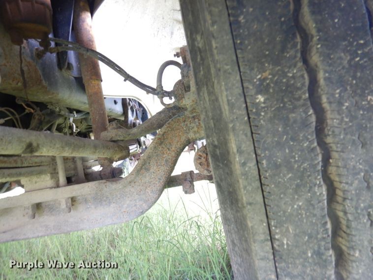 image for item DG0841 2002 Freightliner FL60  flatbed truck