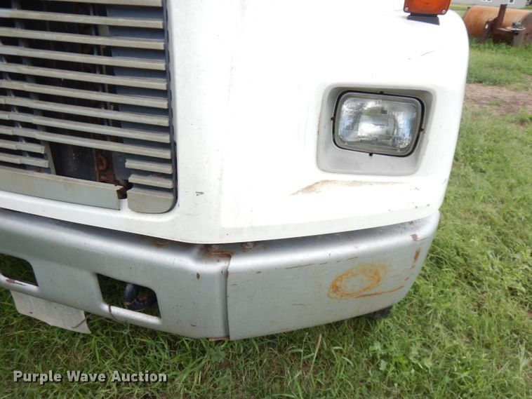 image for item DG0841 2002 Freightliner FL60  flatbed truck