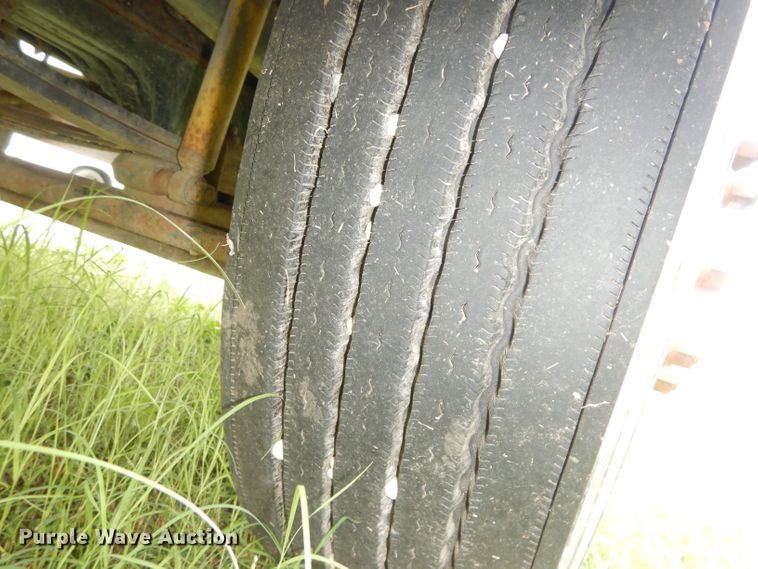 image for item DG0841 2002 Freightliner FL60  flatbed truck