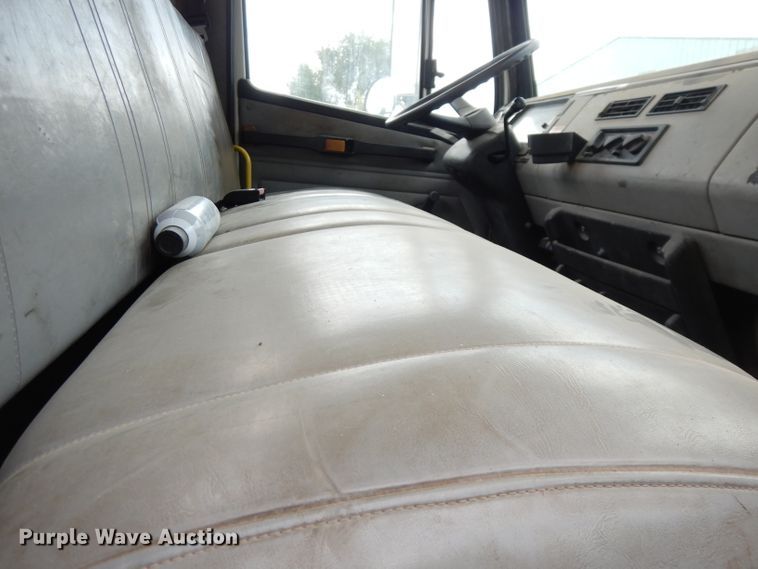 image for item DG0841 2002 Freightliner FL60  flatbed truck