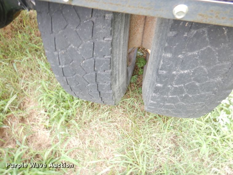 image for item DG0841 2002 Freightliner FL60  flatbed truck