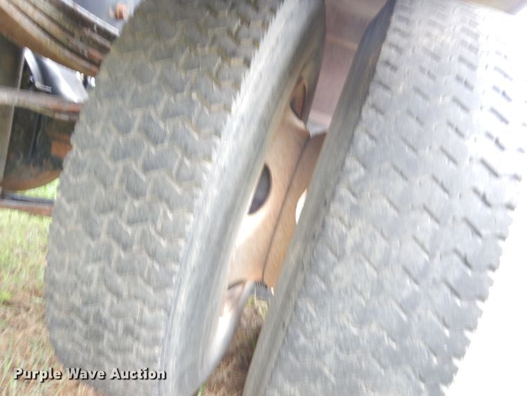 image for item DG0841 2002 Freightliner FL60  flatbed truck