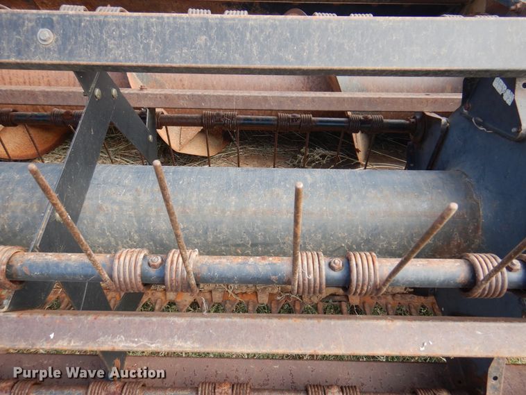 image for item DK8136 1995 MacDon 9000  windrower
