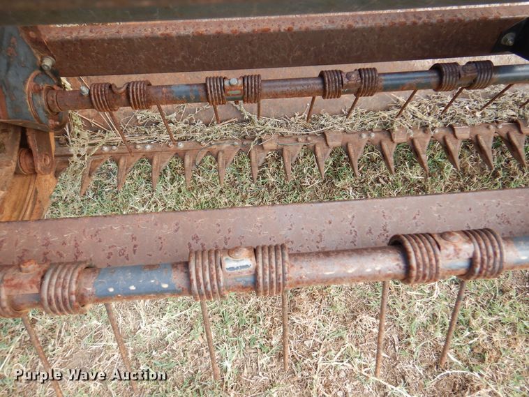 image for item DK8136 1995 MacDon 9000  windrower