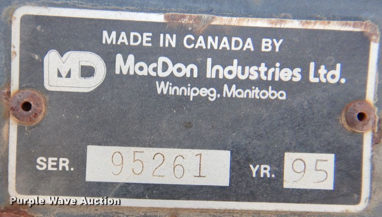 image for item DK8136 1995 MacDon 9000  windrower