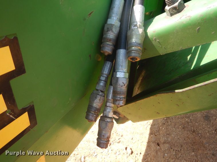 image for item JI9482 2005 John Deere 735  windrower