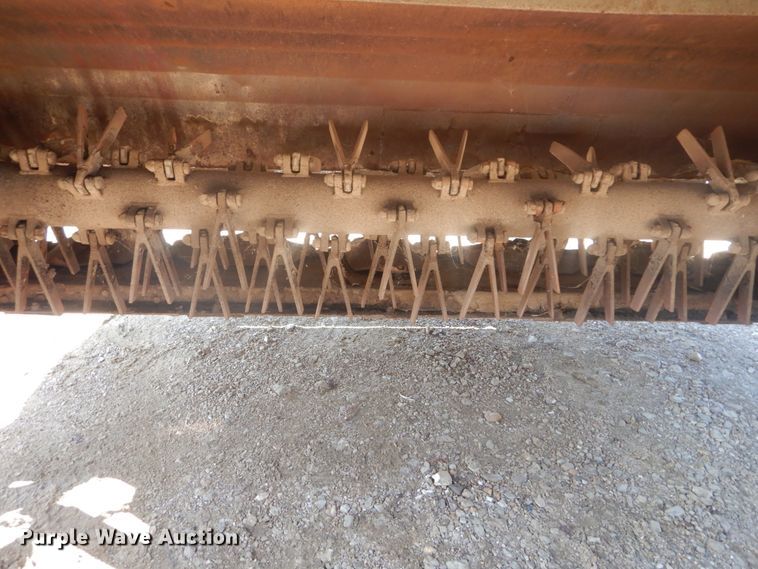 image for item JI9482 2005 John Deere 735  windrower