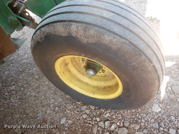 image for item JI9482 2005 John Deere 735  windrower