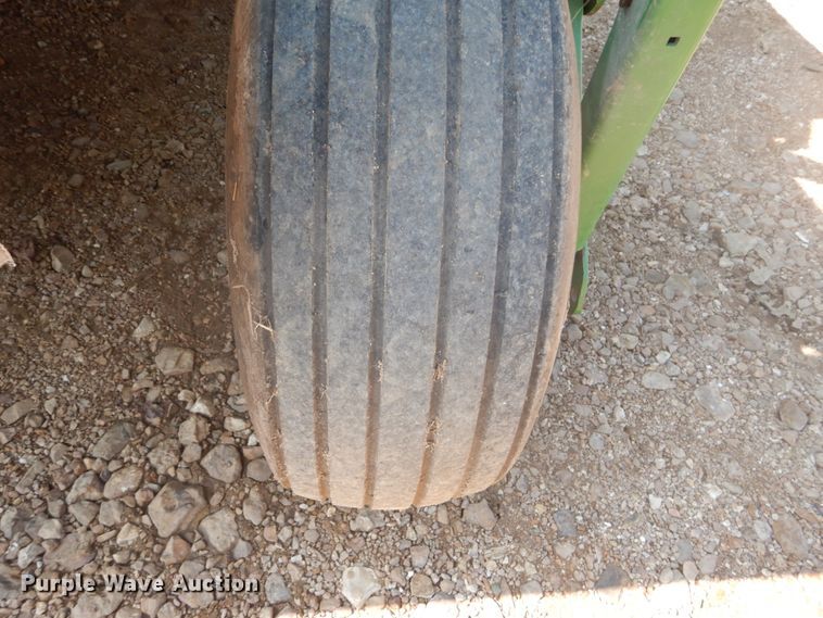 image for item JI9482 2005 John Deere 735  windrower