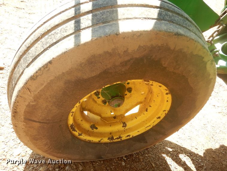 image for item JI9482 2005 John Deere 735  windrower