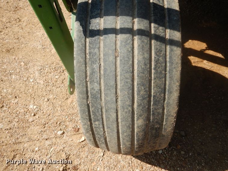 image for item JI9482 2005 John Deere 735  windrower