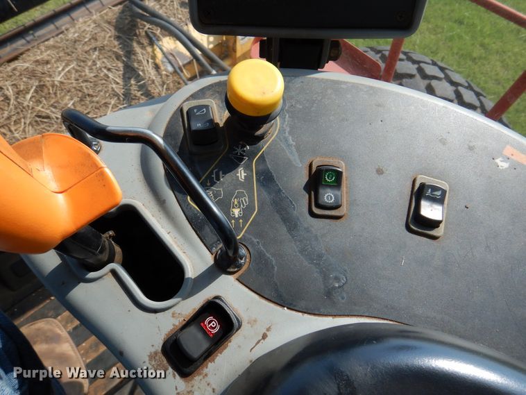 image for item DK2295 2007 New Holland HW325  windrower