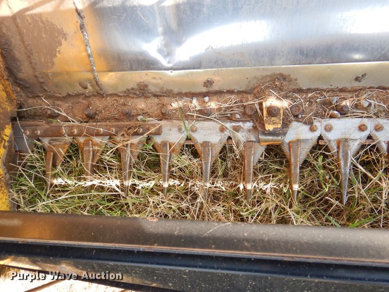 image for item DK2296 2007 New Holland HW325  windrower