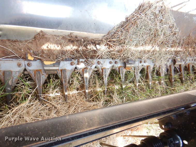 image for item DK2296 2007 New Holland HW325  windrower