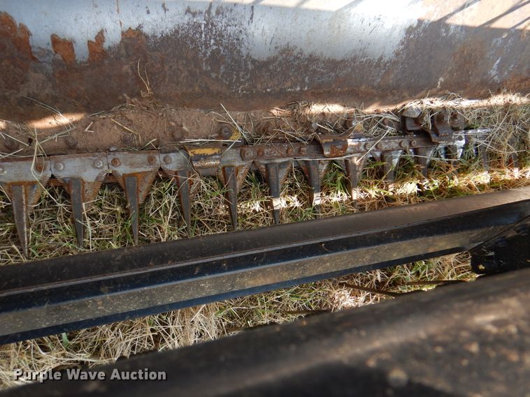 image for item DK2296 2007 New Holland HW325  windrower