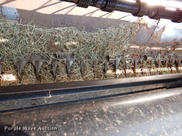 image for item DK2296 2007 New Holland HW325  windrower