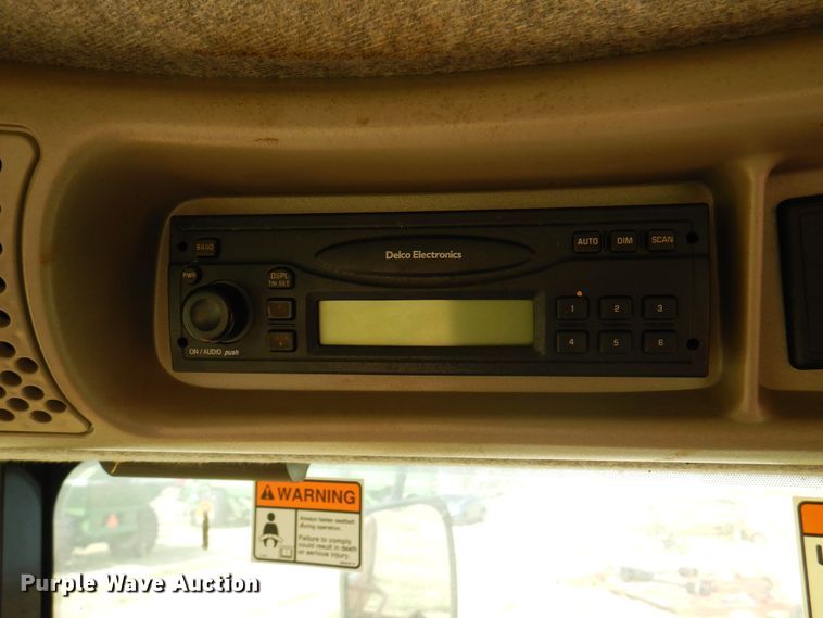 image for item DK2296 2007 New Holland HW325  windrower