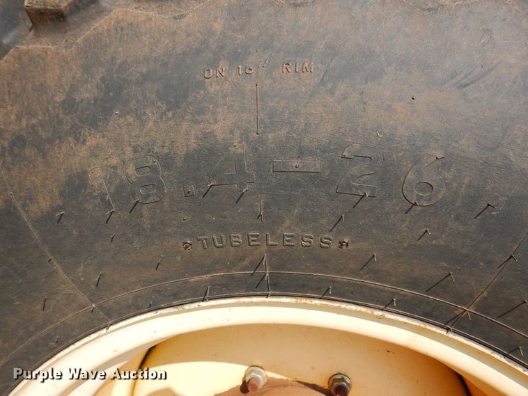 image for item DK2296 2007 New Holland HW325  windrower