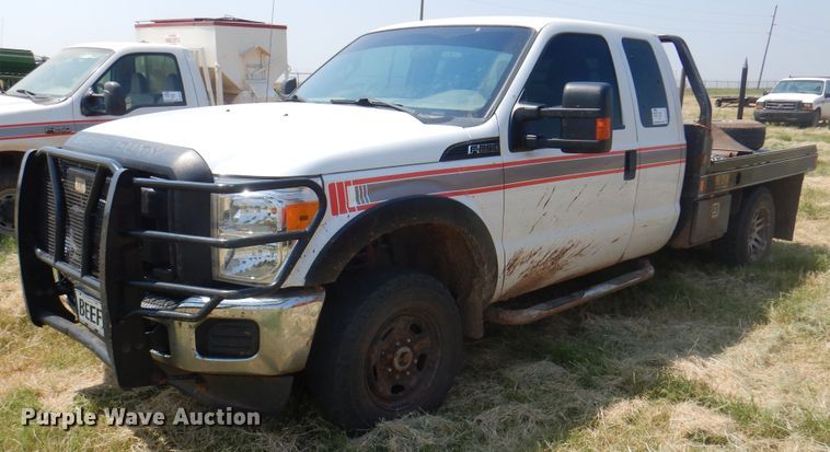 image for item DK2337 2013 Ford F250 Super Duty  SuperCab bale bed pickup truck