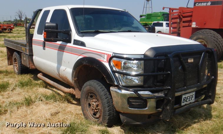 image for item DK2337 2013 Ford F250 Super Duty  SuperCab bale bed pickup truck