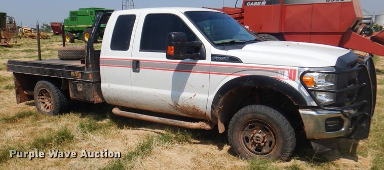 image for item DK2337 2013 Ford F250 Super Duty  SuperCab bale bed pickup truck