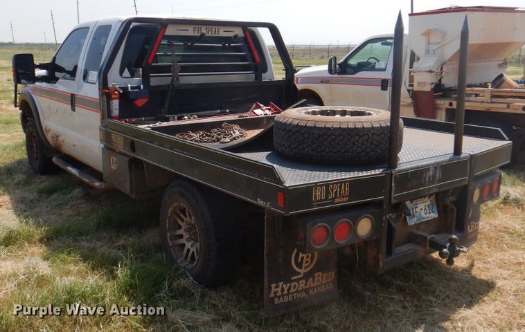 image for item DK2337 2013 Ford F250 Super Duty  SuperCab bale bed pickup truck