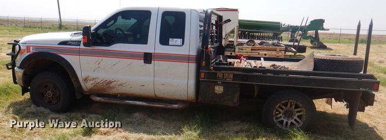 image for item DK2337 2013 Ford F250 Super Duty  SuperCab bale bed pickup truck