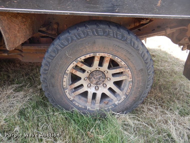 image for item DK2337 2013 Ford F250 Super Duty  SuperCab bale bed pickup truck