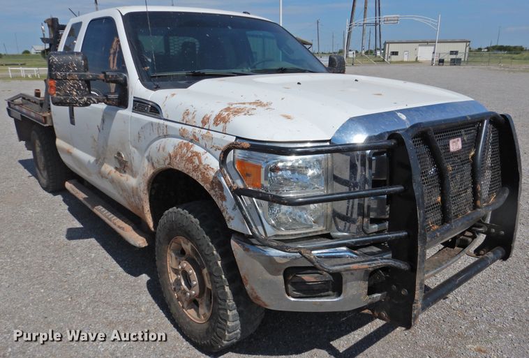 image for item DK2429 2015 Ford F250 Super Duty  SuperCab bale bed pickup truck