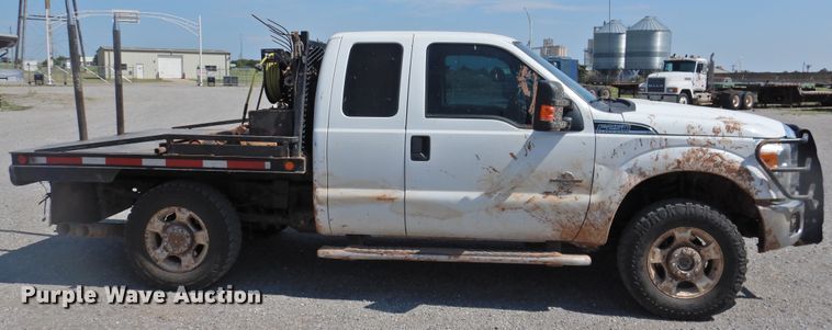 image for item DK2429 2015 Ford F250 Super Duty  SuperCab bale bed pickup truck