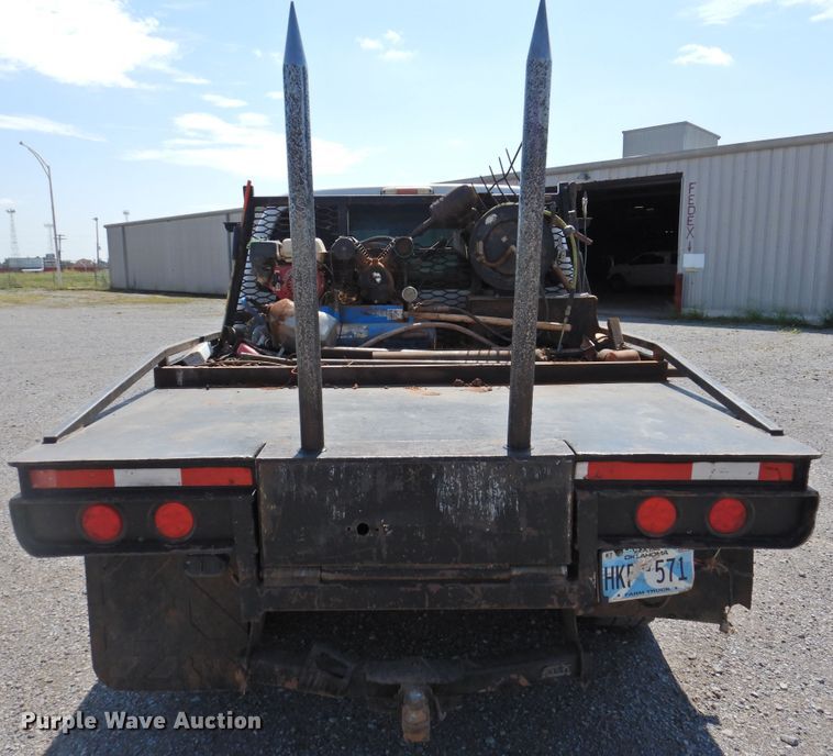 image for item DK2429 2015 Ford F250 Super Duty  SuperCab bale bed pickup truck