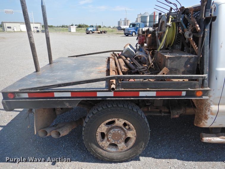 image for item DK2429 2015 Ford F250 Super Duty  SuperCab bale bed pickup truck