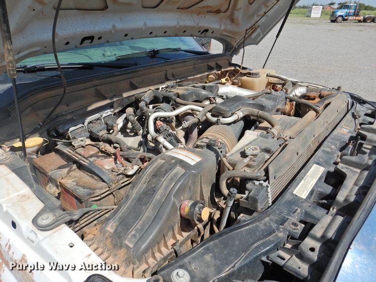 image for item DK2429 2015 Ford F250 Super Duty  SuperCab bale bed pickup truck