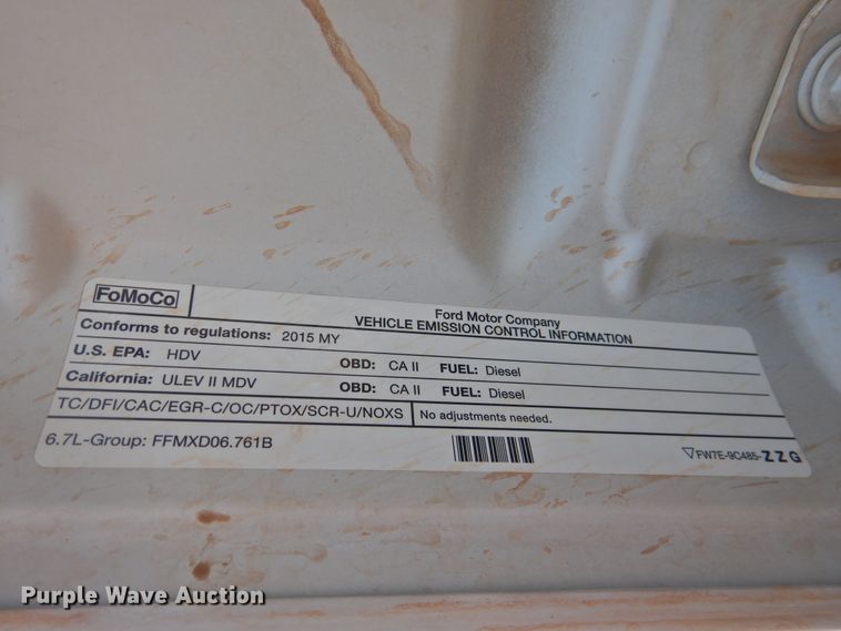 image for item DK2429 2015 Ford F250 Super Duty  SuperCab bale bed pickup truck