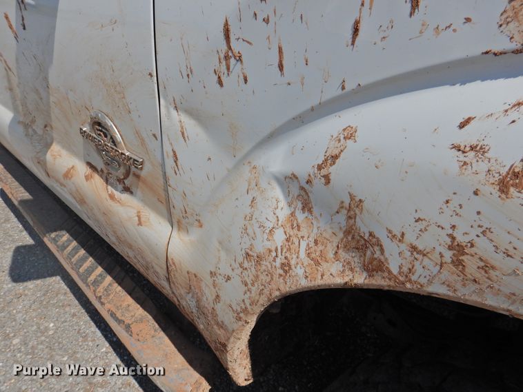 image for item DK2429 2015 Ford F250 Super Duty  SuperCab bale bed pickup truck